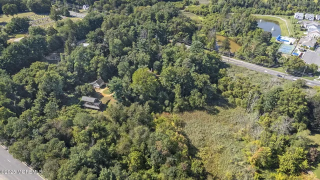 a view of a house with a tree