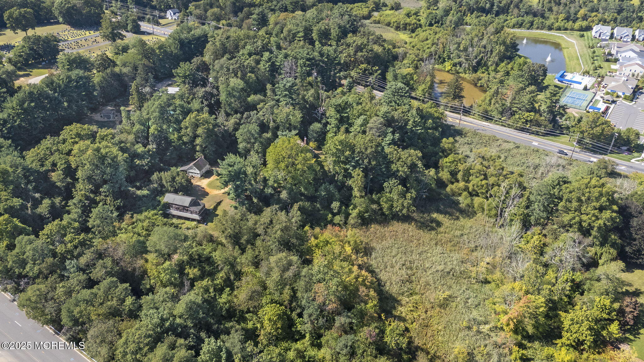 100 Highway 33 Freehold, NJ 07728 - Photo 15 of 26 a view of a house with a tree
