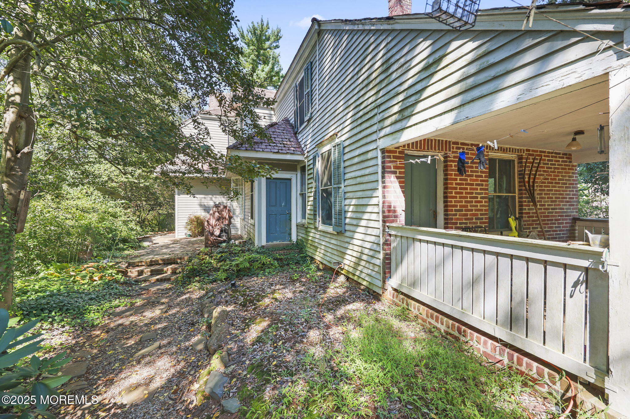 100 Highway 33 Freehold, NJ 07728 - Photo 19 of 26 a view of a house with backyard and porch