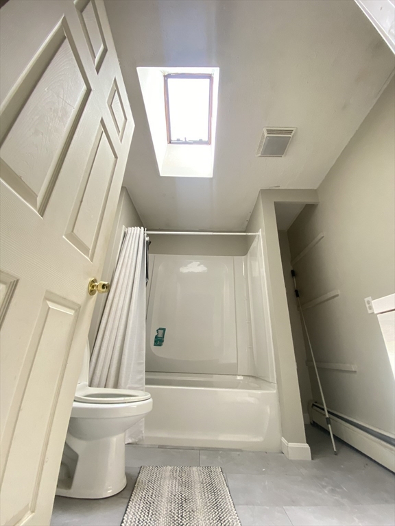 266 Massasoit Road Worcester, MA 01604 - Photo 12 of 26 a bathroom with a toilet and a shower