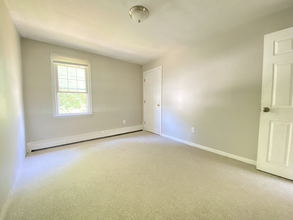 266 Massasoit Road Worcester, MA 01604 - Photo 14 of 26 an empty room with windows