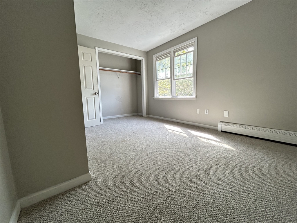 266 Massasoit Road Worcester, MA 01604 - Photo 21 of 26 an empty room with windows