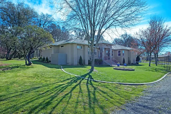 a view of a backyard with a garden