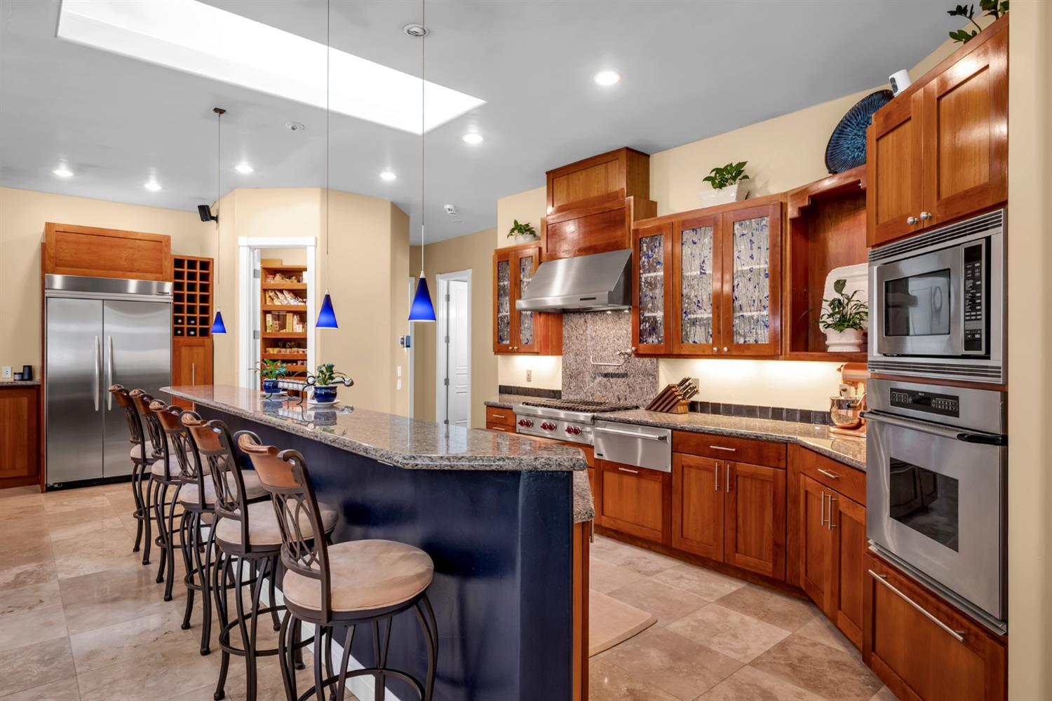 2847 Sierra Vista Road Rescue, CA 95672 - Photo 14 of 69 a kitchen with stainless steel appliances granite countertop a stove a sink a microwave and a refrigerator