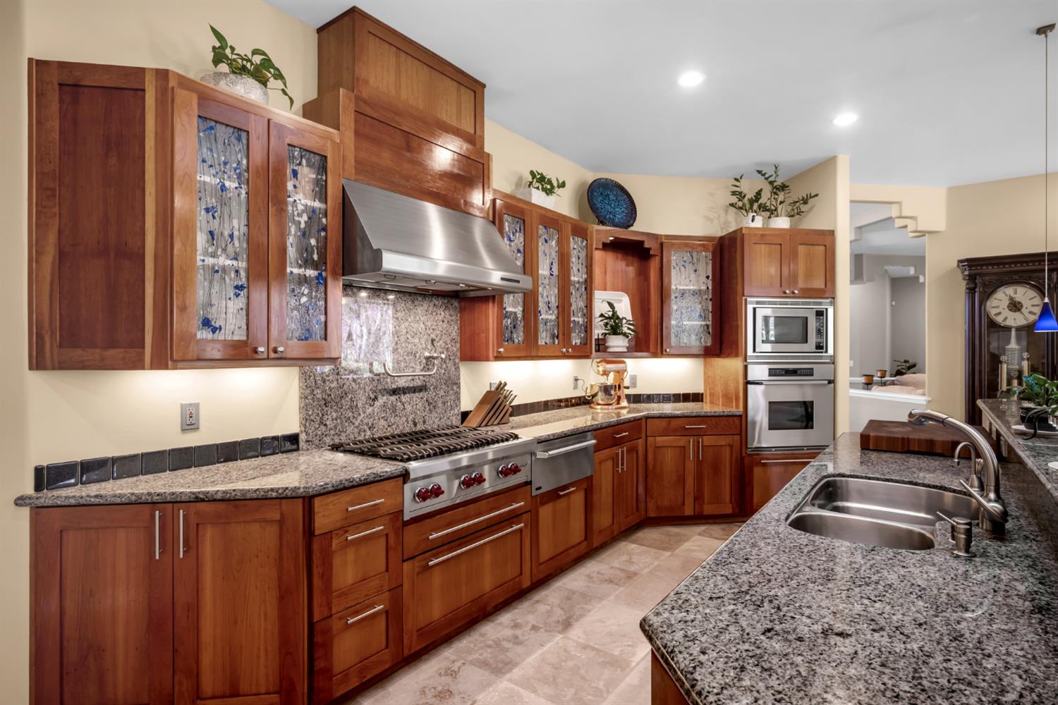 2847 Sierra Vista Road Rescue, CA 95672 - Photo 17 of 69 a kitchen with stainless steel appliances granite countertop a stove a sink and a microwave