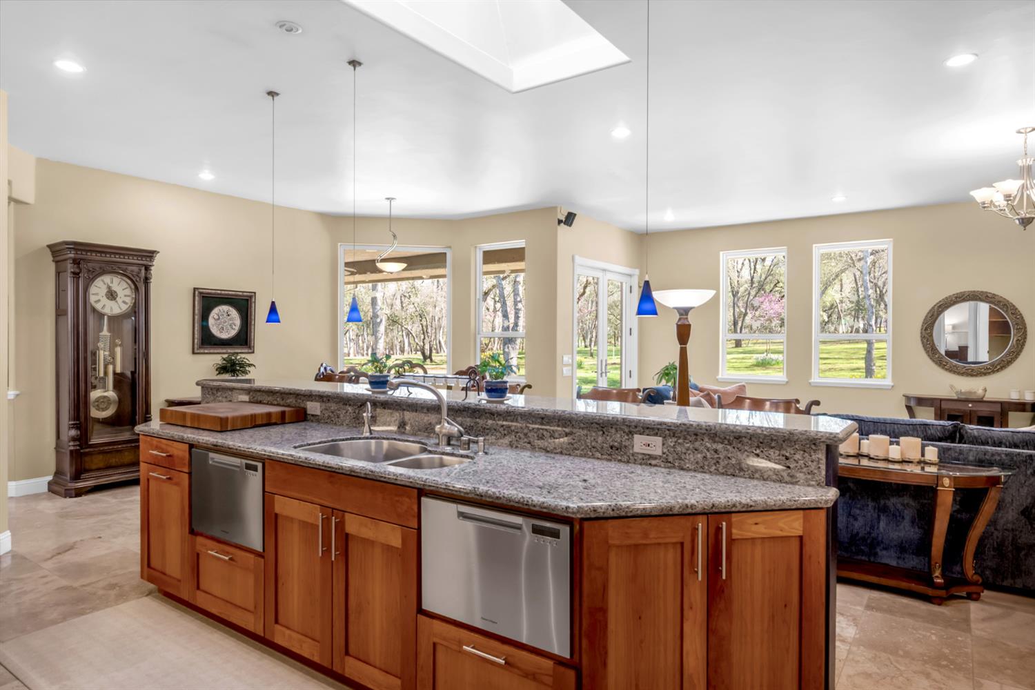 2847 Sierra Vista Road Rescue, CA 95672 - Photo 18 of 69 a kitchen with granite countertop a sink and a wooden cabinets