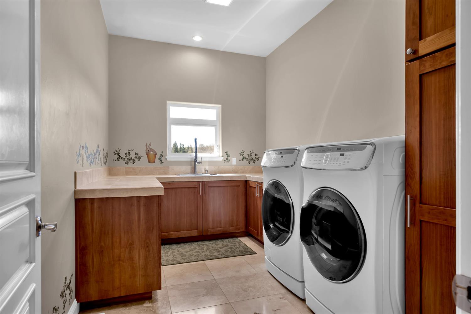 2847 Sierra Vista Road Rescue, CA 95672 - Photo 25 of 69 a utility room with sink dryer and washer