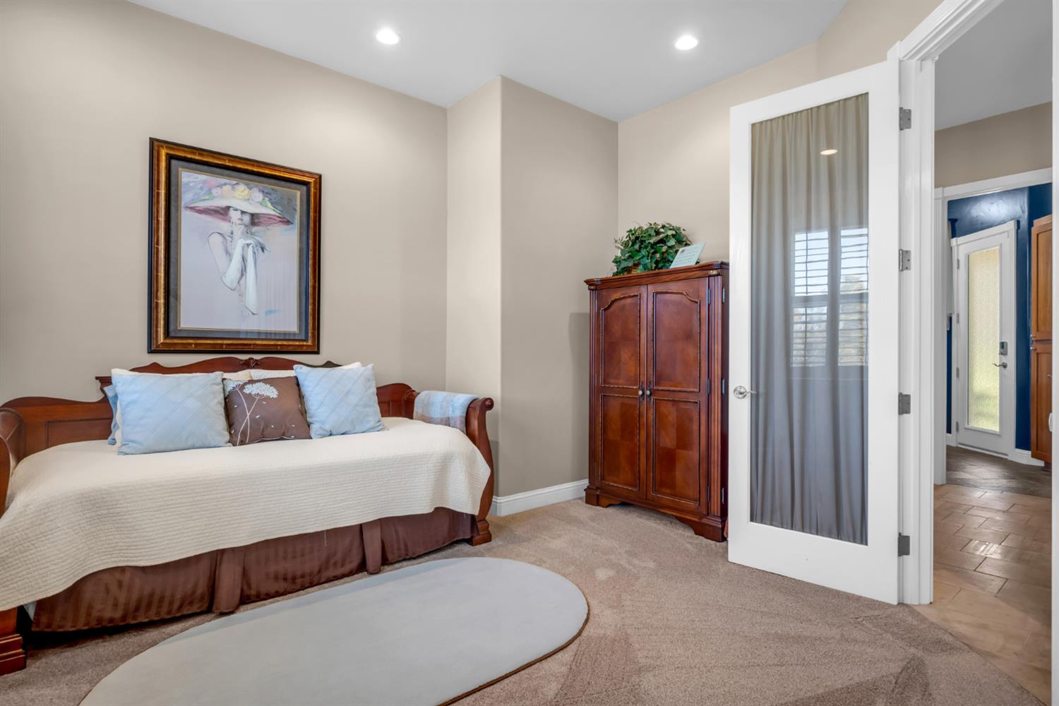 2847 Sierra Vista Road Rescue, CA 95672 - Photo 28 of 69 a bedroom with a bed and a chandelier