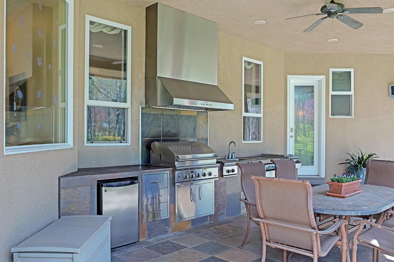 2847 Sierra Vista Road Rescue, CA 95672 - Photo 35 of 69 a kitchen with a stove a table and chairs in it