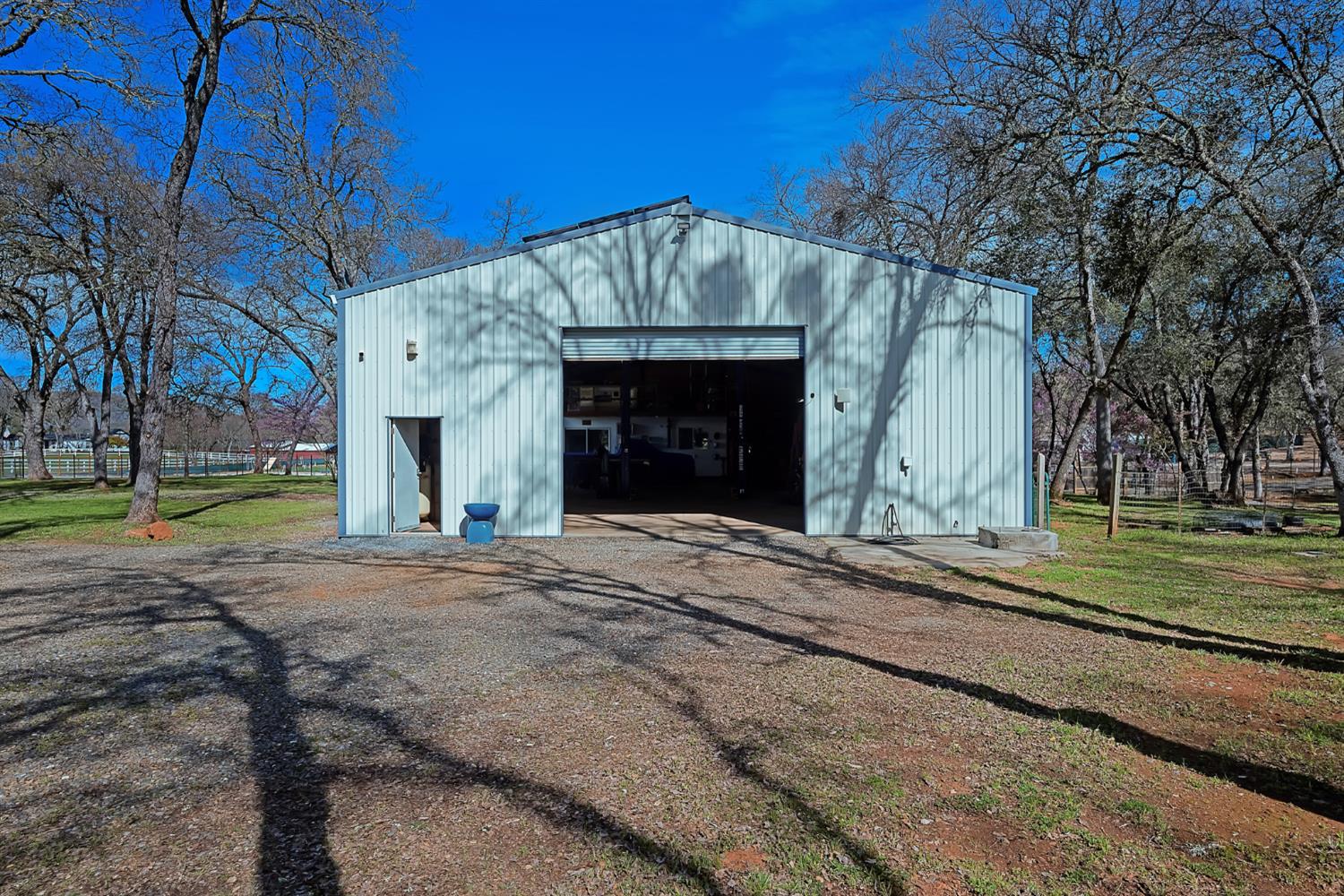 2847 Sierra Vista Road Rescue, CA 95672 - Photo 42 of 69 a view of a house with a yard and garage