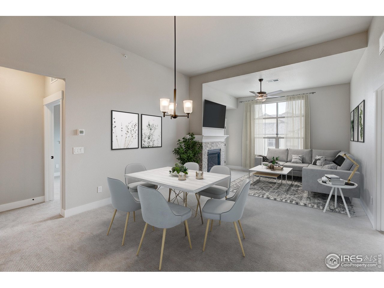 975 Landmark Way, Unit 11 Fort Collins, CO 80524 - Photo 5 of 16 a view of a dining room with furniture window and wooden floor