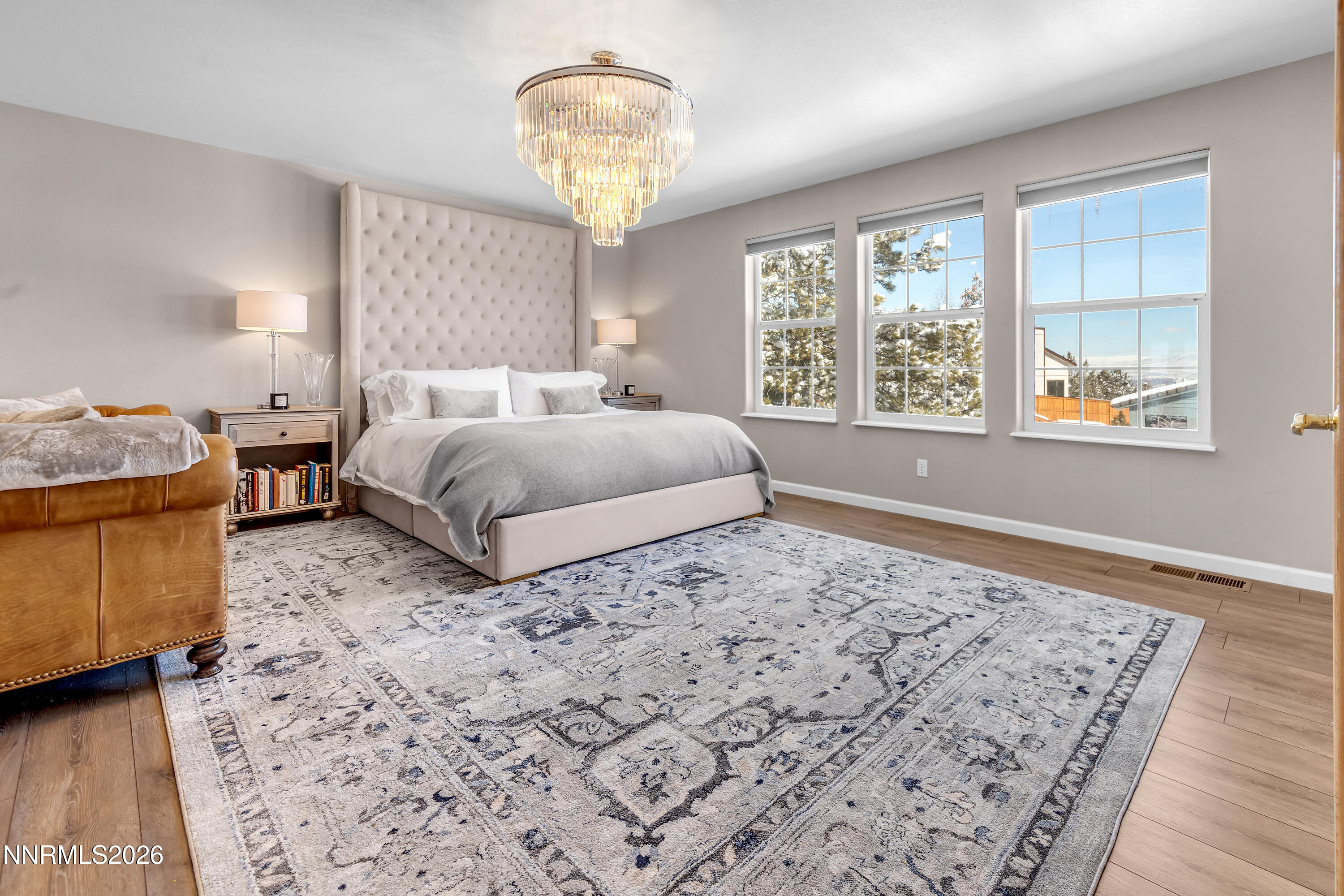 2677 Chaparral Drive Reno, NV 89509 - Photo 16 of 35 a spacious bedroom with a bed and window