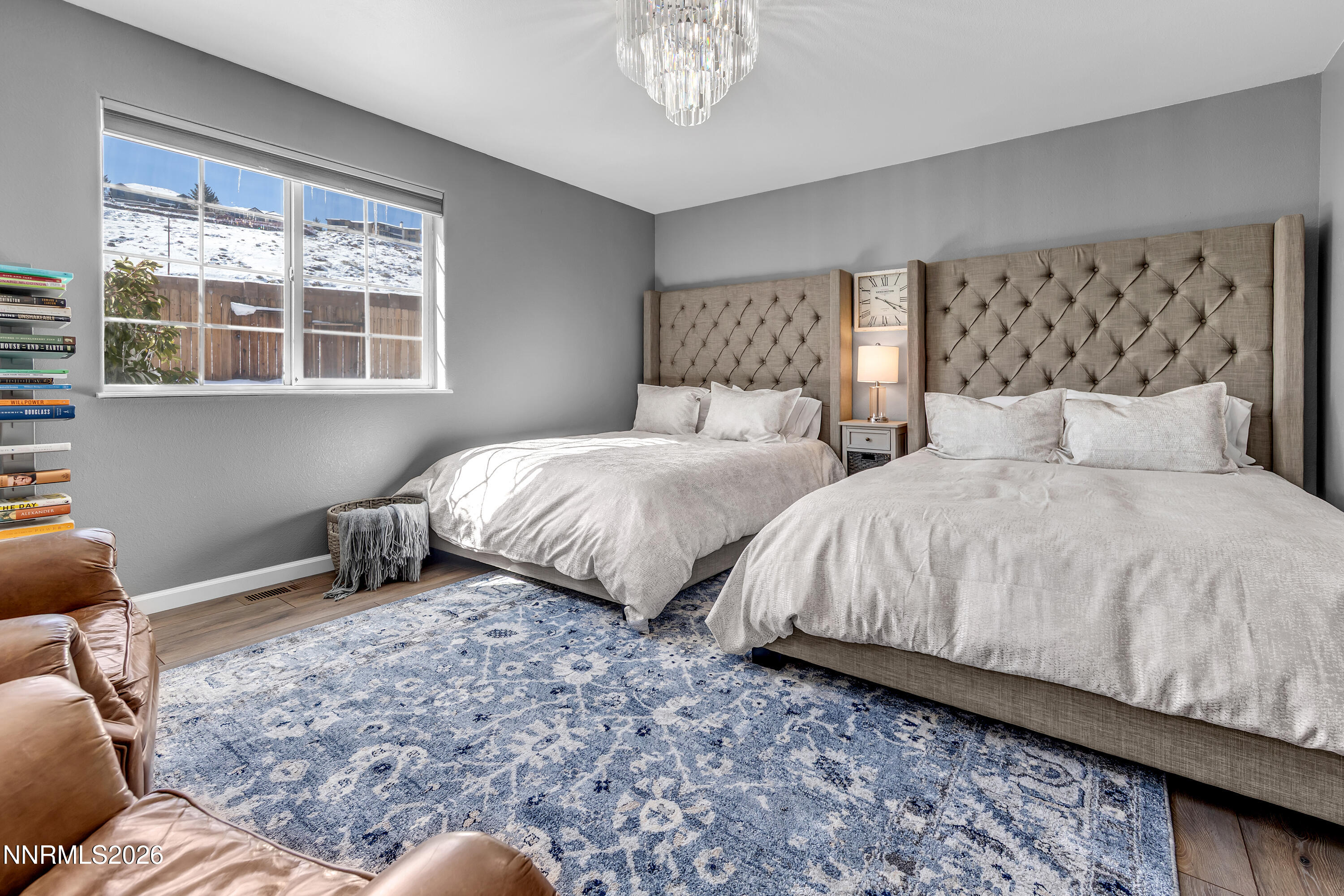 2677 Chaparral Drive Reno, NV 89509 - Photo 19 of 35 a bedroom with double bed and a window