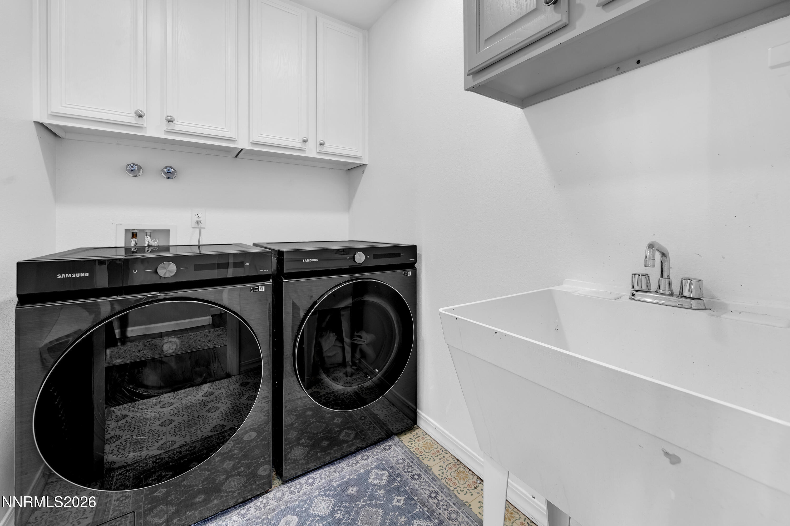 2677 Chaparral Drive Reno, NV 89509 - Photo 23 of 35 a utility room with sink dryer and washer