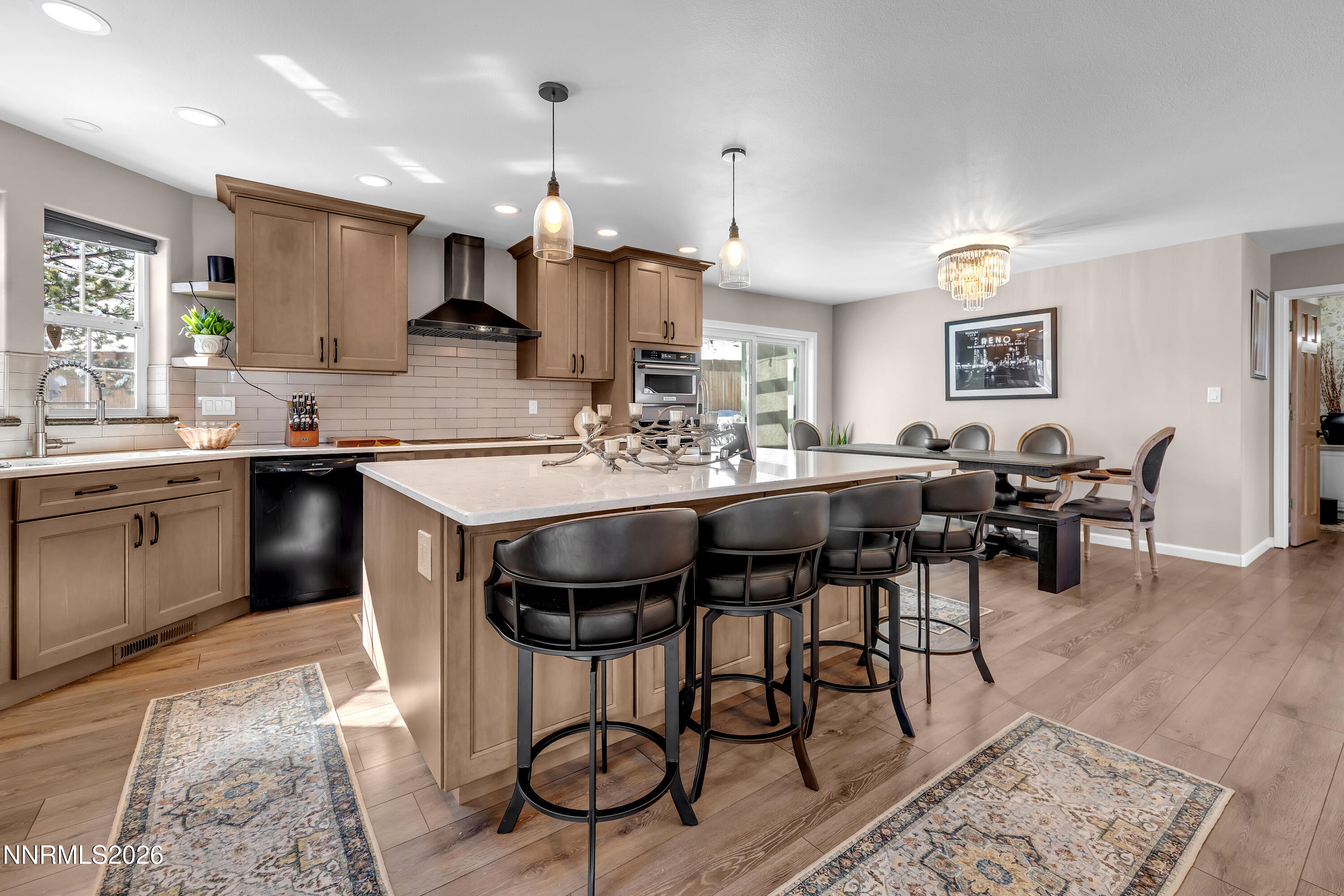 2677 Chaparral Drive Reno, NV 89509 - Photo 3 of 35 a kitchen with a dining table and chairs