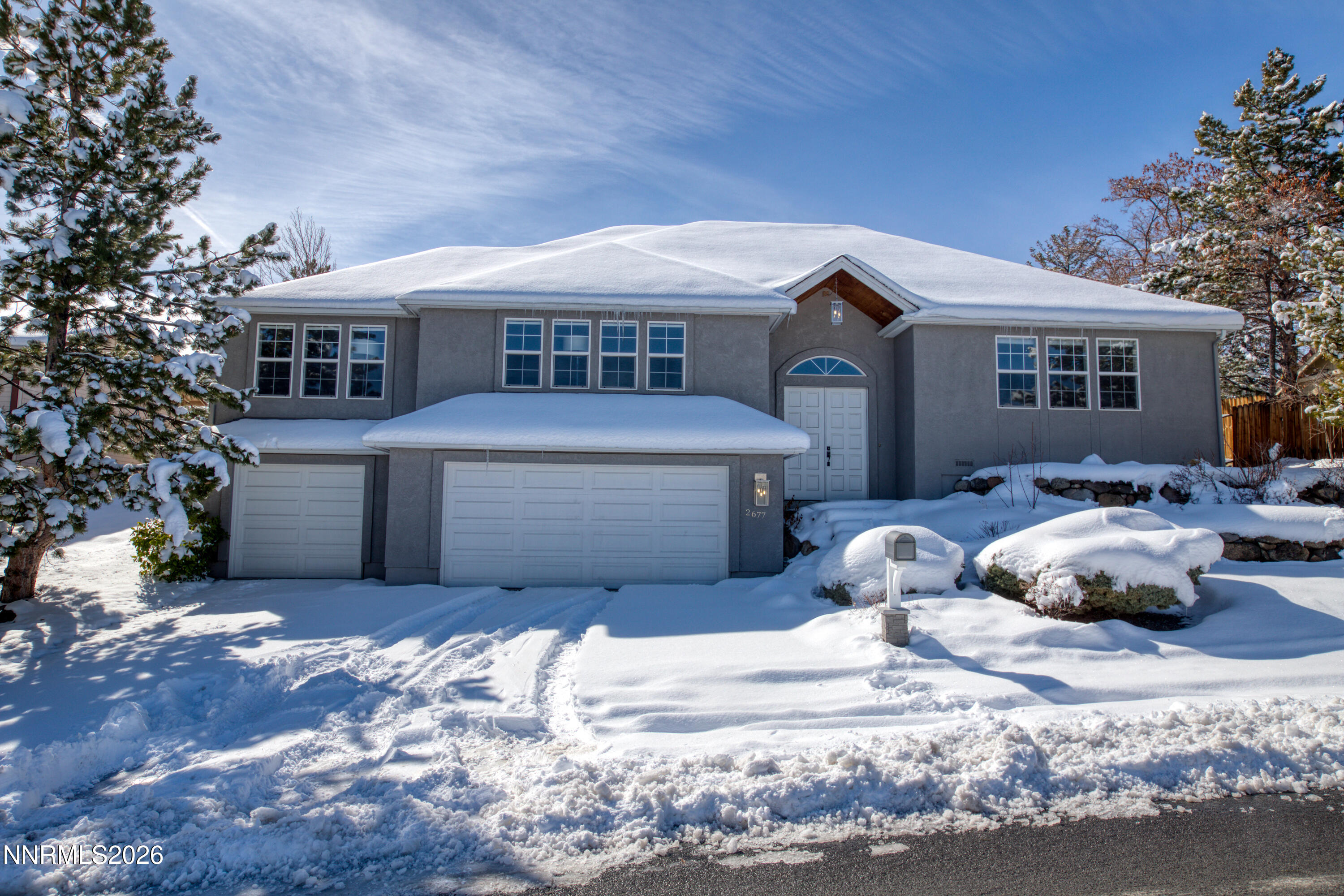 2677 Chaparral Drive Reno, NV 89509 - Photo 32 of 35 a front view of a house with a yard