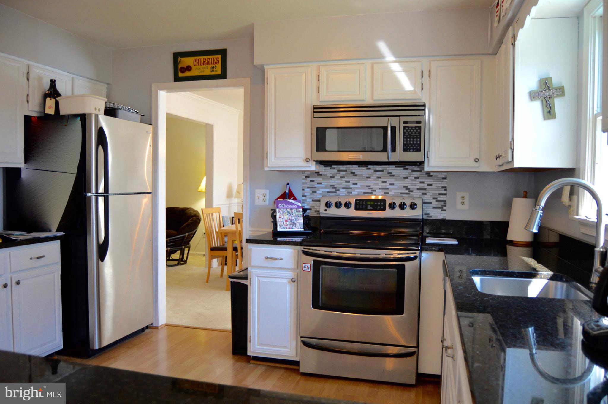 2131 Silentree Drive Vienna, VA 22182 - Photo 11 of 25 Stainless Steel Appliances & Granite Counters