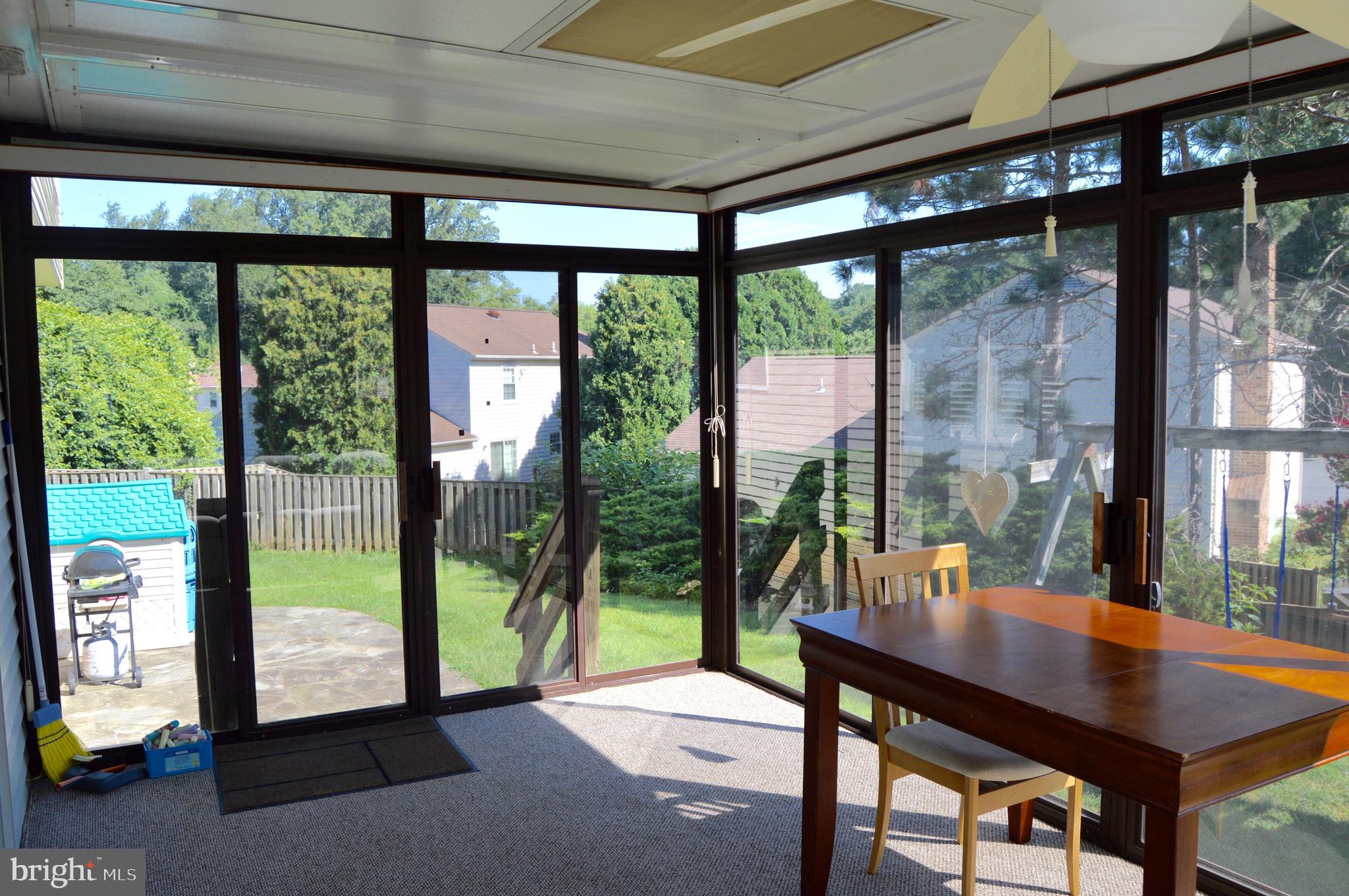 2131 Silentree Drive Vienna, VA 22182 - Photo 17 of 25 Floor to Ceiling Glass Windows in Sunroom