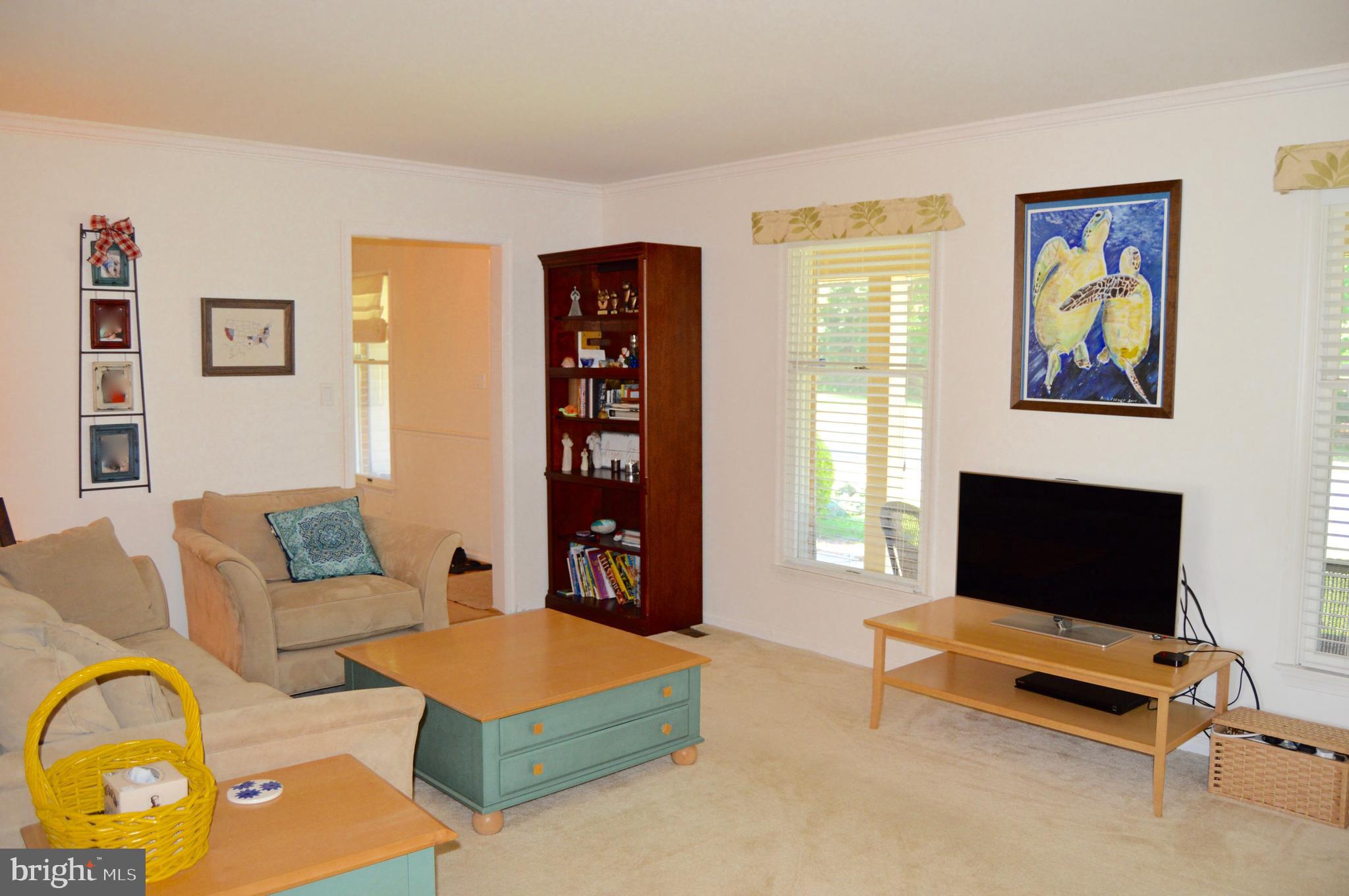 2131 Silentree Drive Vienna, VA 22182 - Photo 7 of 25 Two Windows for Ample Natural Light in Living Room
