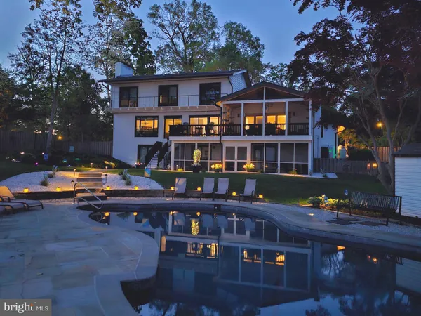 a living room with fireplace furniture and a flat screen tv