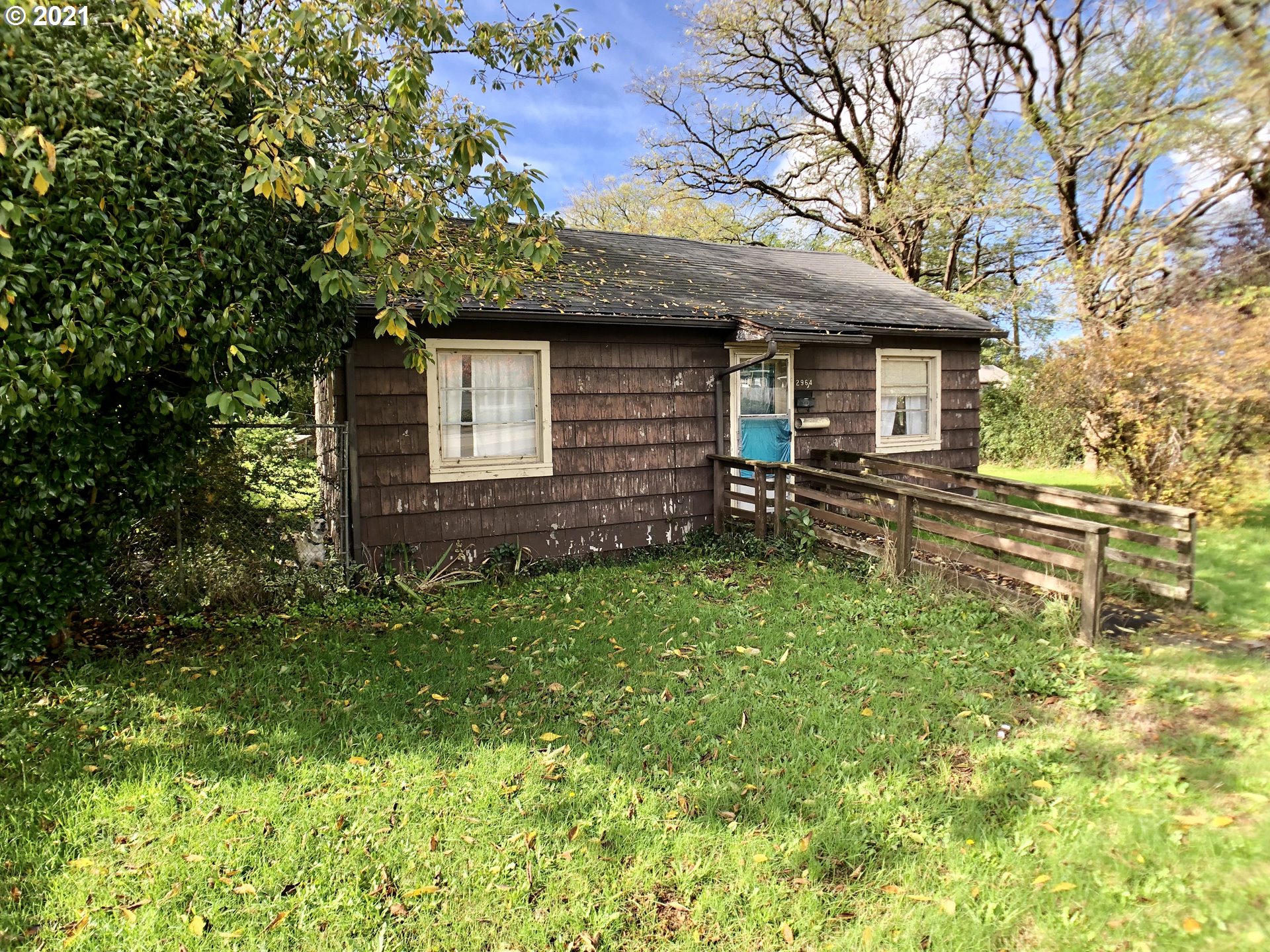 2964 Broadway Avenue North Bend, OR 97459 - Photo 4 of 6 a backyard of a house with seating space
