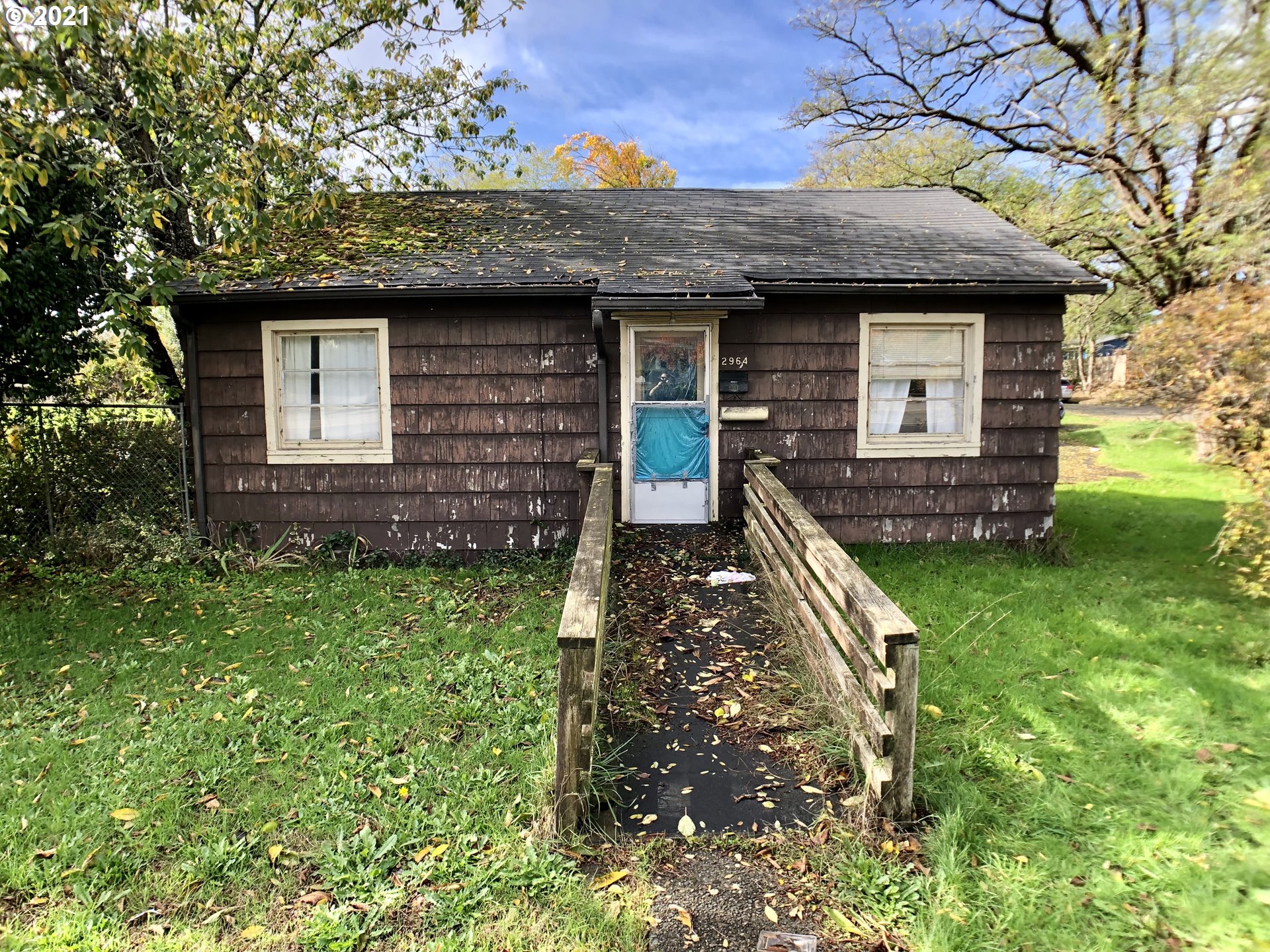 2964 Broadway Avenue North Bend, OR 97459 - Photo 5 of 6 a front view of a house with garden