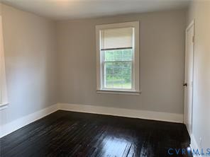 3317 Waverly Boulevard, Unit B Richmond, VA 23222 - Photo 20 of 36 wooden floor in an empty room