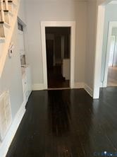 3317 Waverly Boulevard, Unit B Richmond, VA 23222 - Photo 2 of 36 an empty room with wooden floor and windows