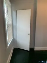 a view of a room that has a window in it