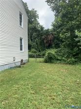 3317 Waverly Boulevard, Unit B Richmond, VA 23222 - Photo 35 of 36 a backyard of a house with lots of green space