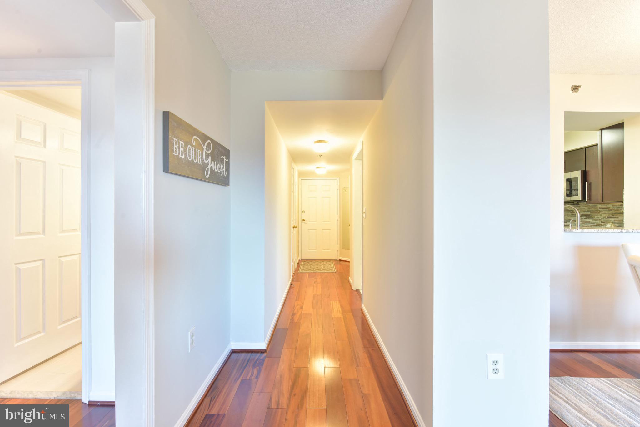 545 East Braddock Road, Unit 201 Alexandria, VA 22314 - Photo 22 of 32 Hallway towards front door