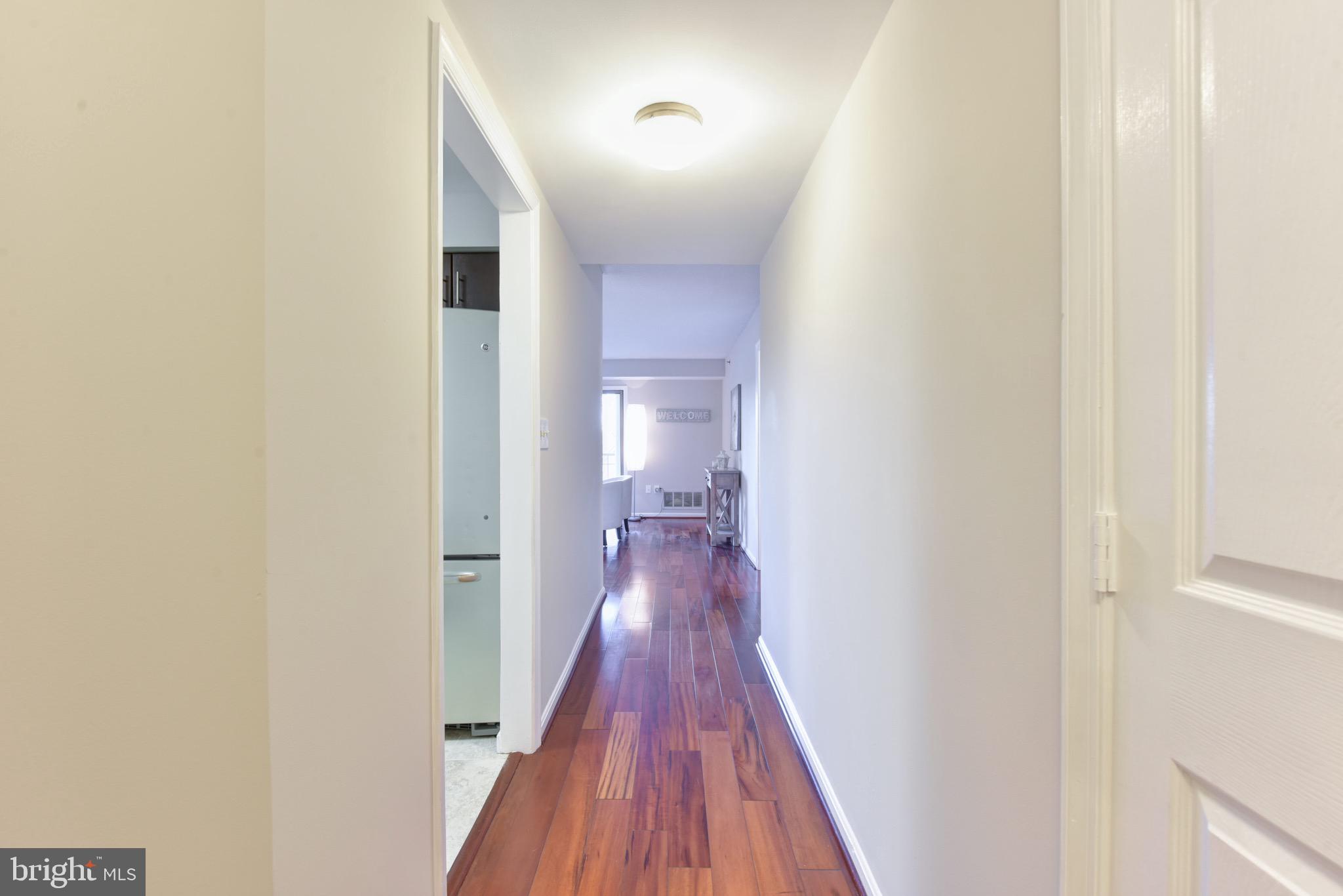 545 East Braddock Road, Unit 201 Alexandria, VA 22314 - Photo 23 of 32 View from front door to living room
