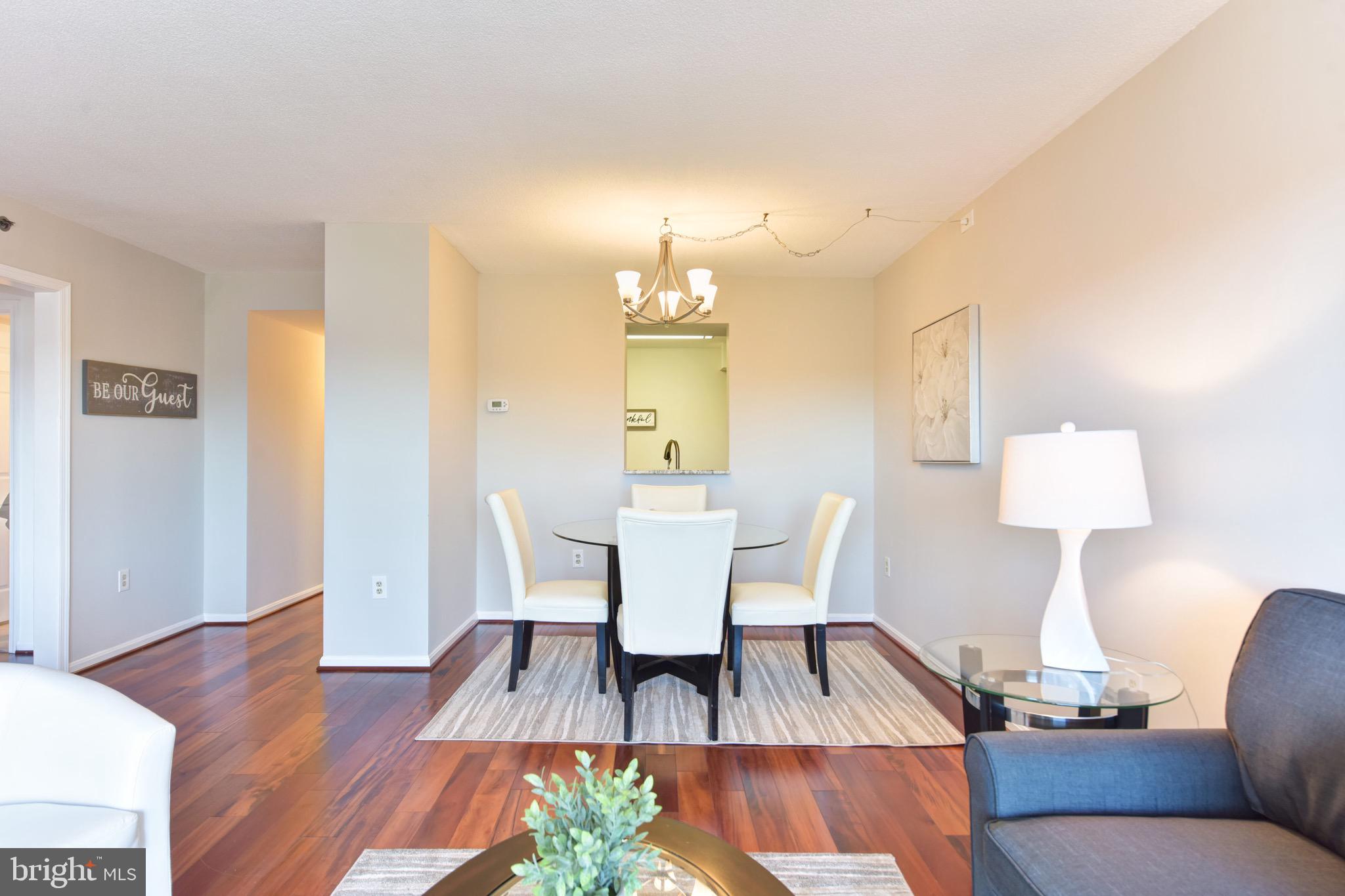 545 East Braddock Road, Unit 201 Alexandria, VA 22314 - Photo 7 of 32 Kitchen pass-thru to dining space