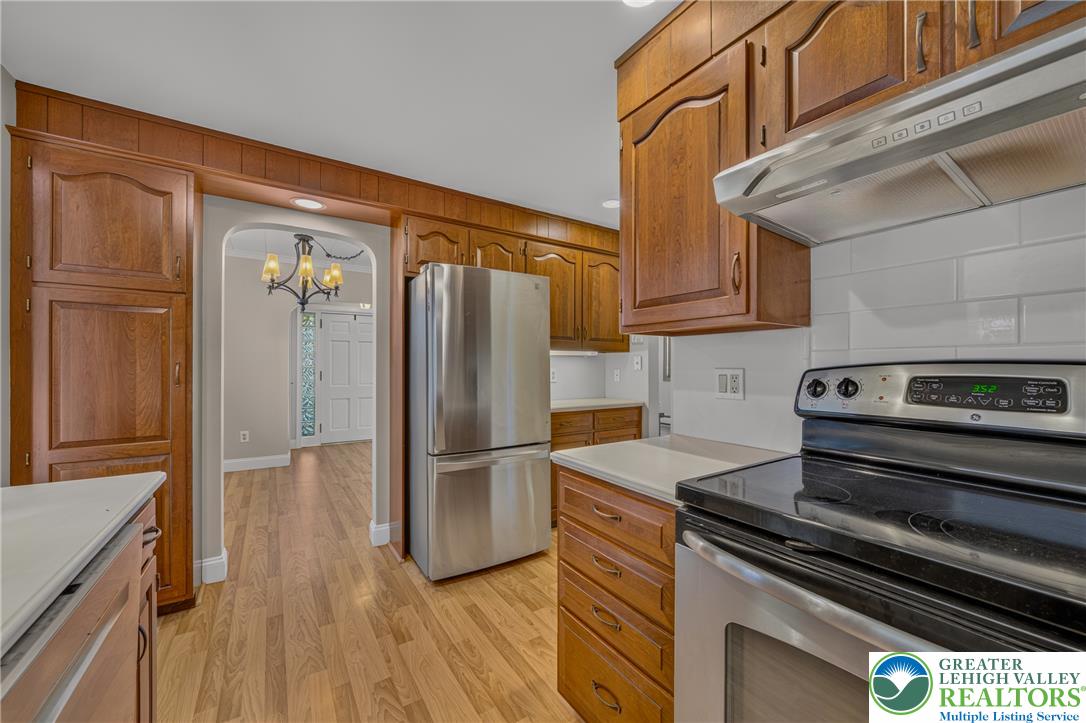 1814 Ruth Street Allentown, PA 18104 - Photo 18 of 54 Rich wood cabinetry paired with classic hardwood floors creates a timeless and welcoming culinary space.