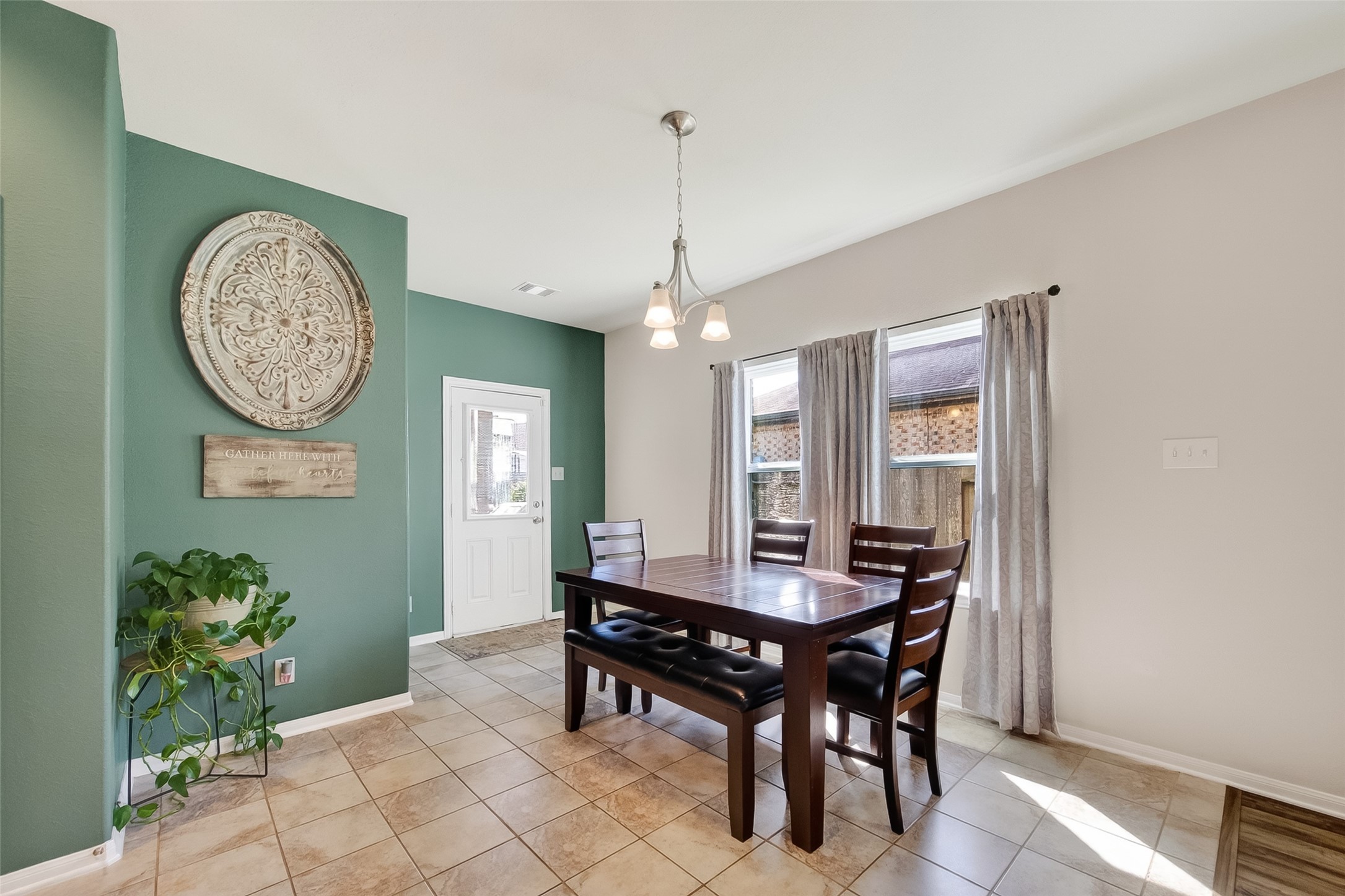 8630 Willet Street Baytown, TX 77521 - Photo 14 of 49 eat-in kitchen with plenty of space for a large family table