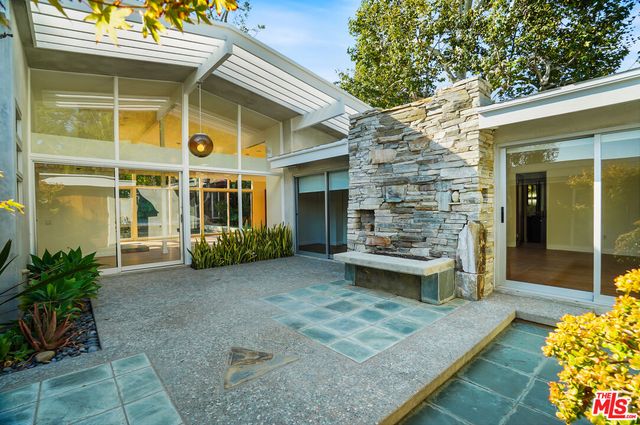 a view of a house with a patio