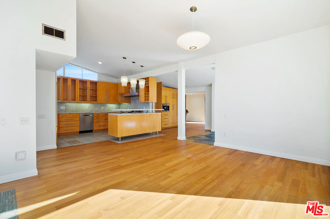 30725 Manzano Drive Malibu, CA 90265 - Photo 23 of 51 a view of a kitchen with a sink and a refrigerator