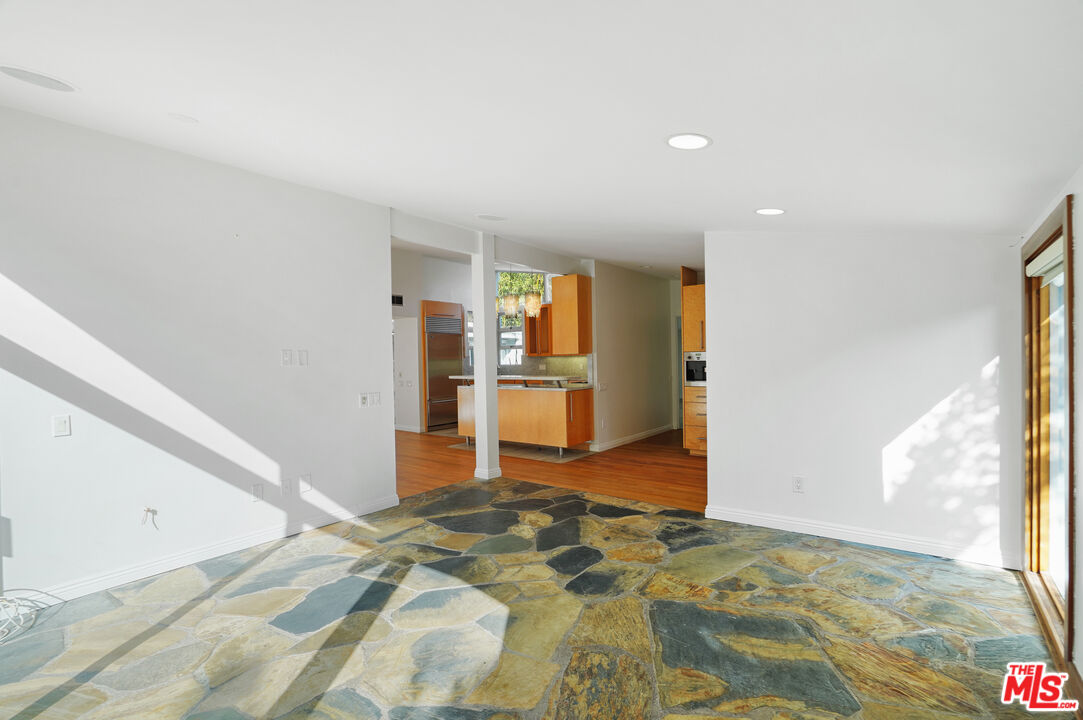 30725 Manzano Drive Malibu, CA 90265 - Photo 25 of 51 a view of a kitchen with wooden floor and a refrigerator