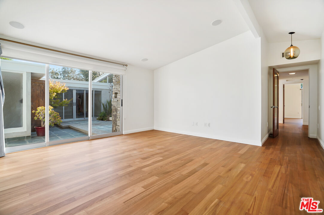 30725 Manzano Drive Malibu, CA 90265 - Photo 28 of 51 a view of an empty room with glass door and a window