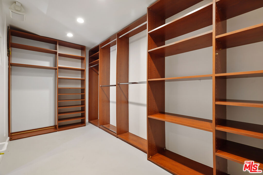 30725 Manzano Drive Malibu, CA 90265 - Photo 33 of 51 a view of walk in closet with empty racks
