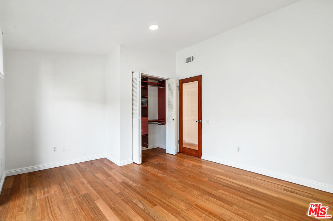 30725 Manzano Drive Malibu, CA 90265 - Photo 35 of 51 a view of empty room with wooden floor