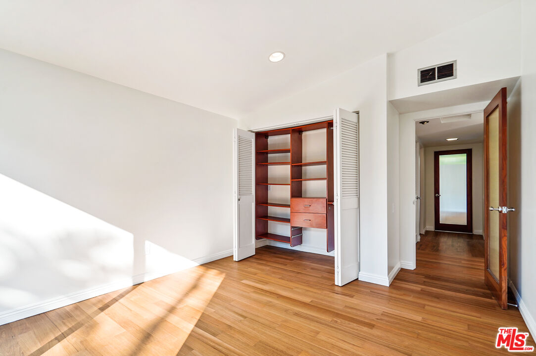 30725 Manzano Drive Malibu, CA 90265 - Photo 39 of 51 a view of a room with wooden floor and bedroom