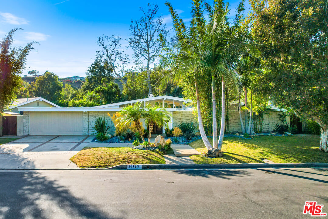 30725 Manzano Drive Malibu, CA 90265 - Photo 4 of 51 a view of a park with large trees
