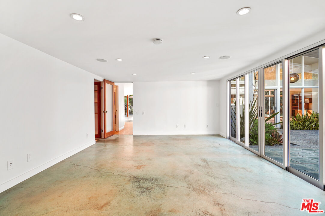 30725 Manzano Drive Malibu, CA 90265 - Photo 44 of 51 a view of an empty room with glass door