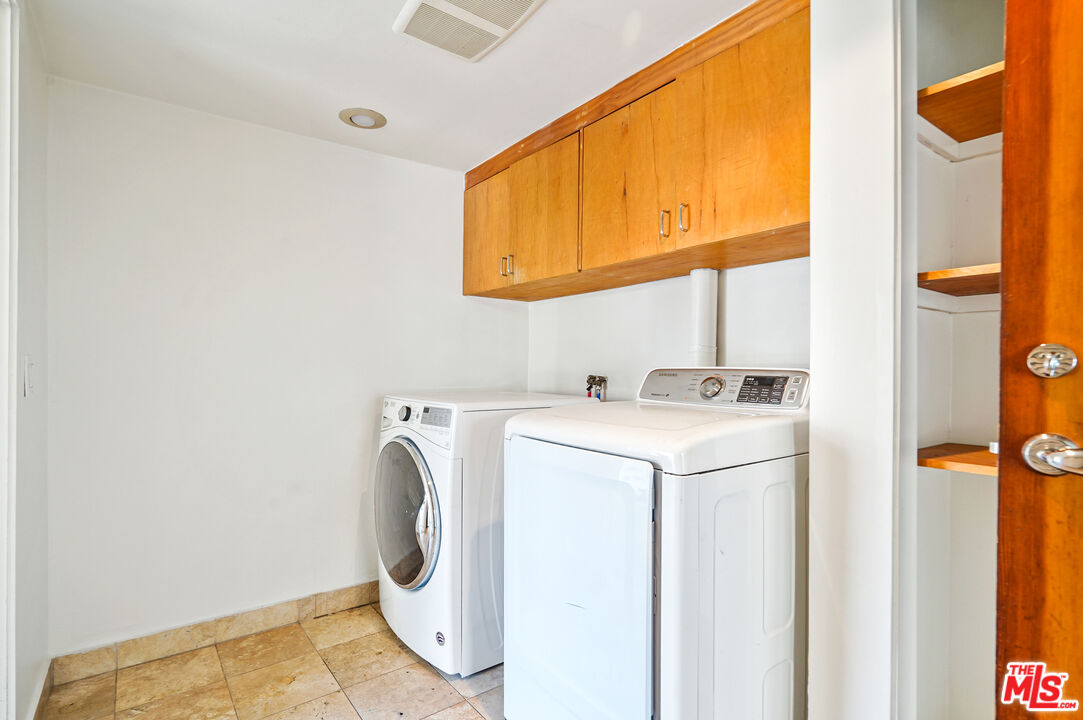 30725 Manzano Drive Malibu, CA 90265 - Photo 46 of 51 a utility room with dryer and washer