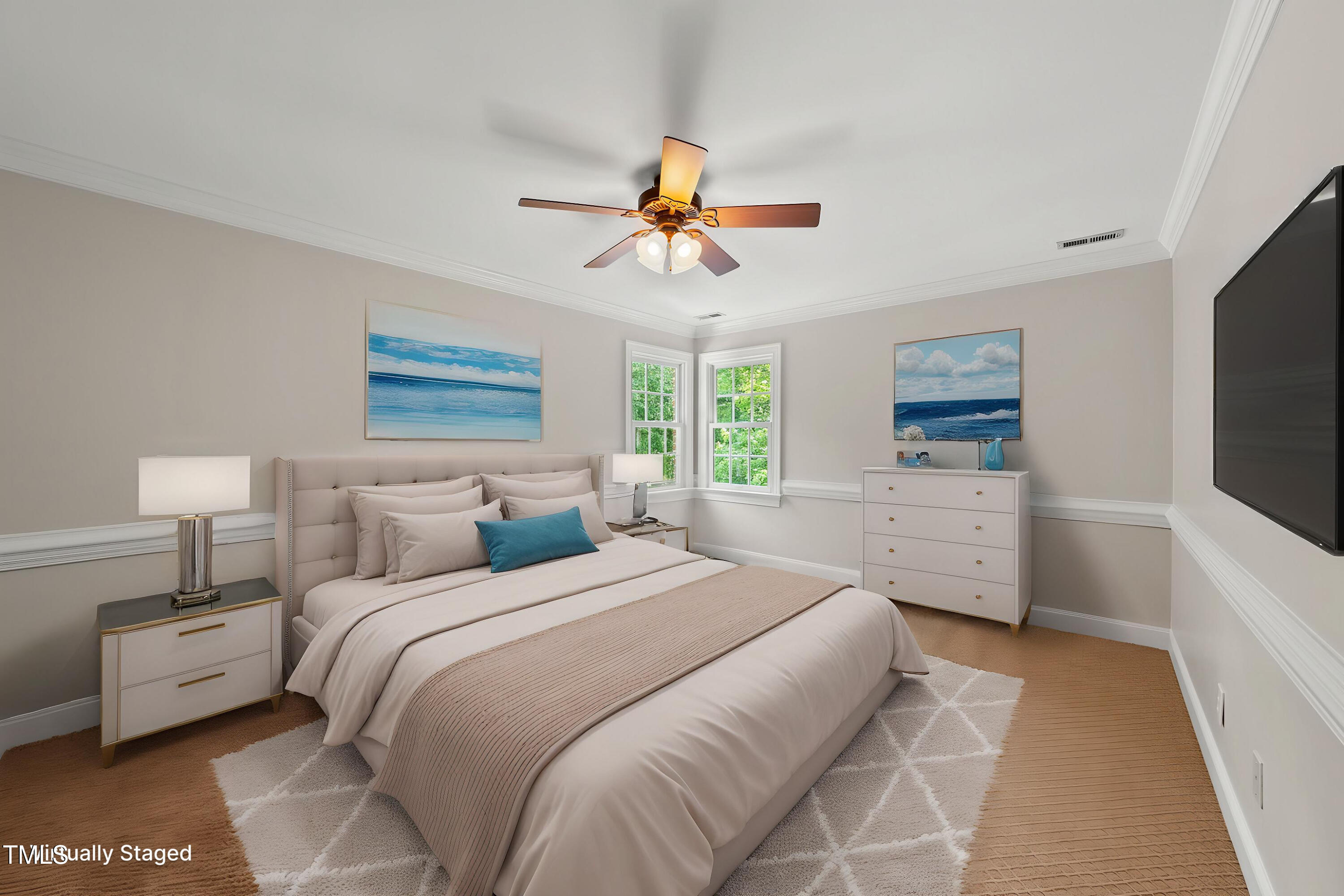 10825 Rondeau Woods Court Raleigh, NC 27614 - Photo 31 of 65 a bedroom with a bed and a flat screen tv