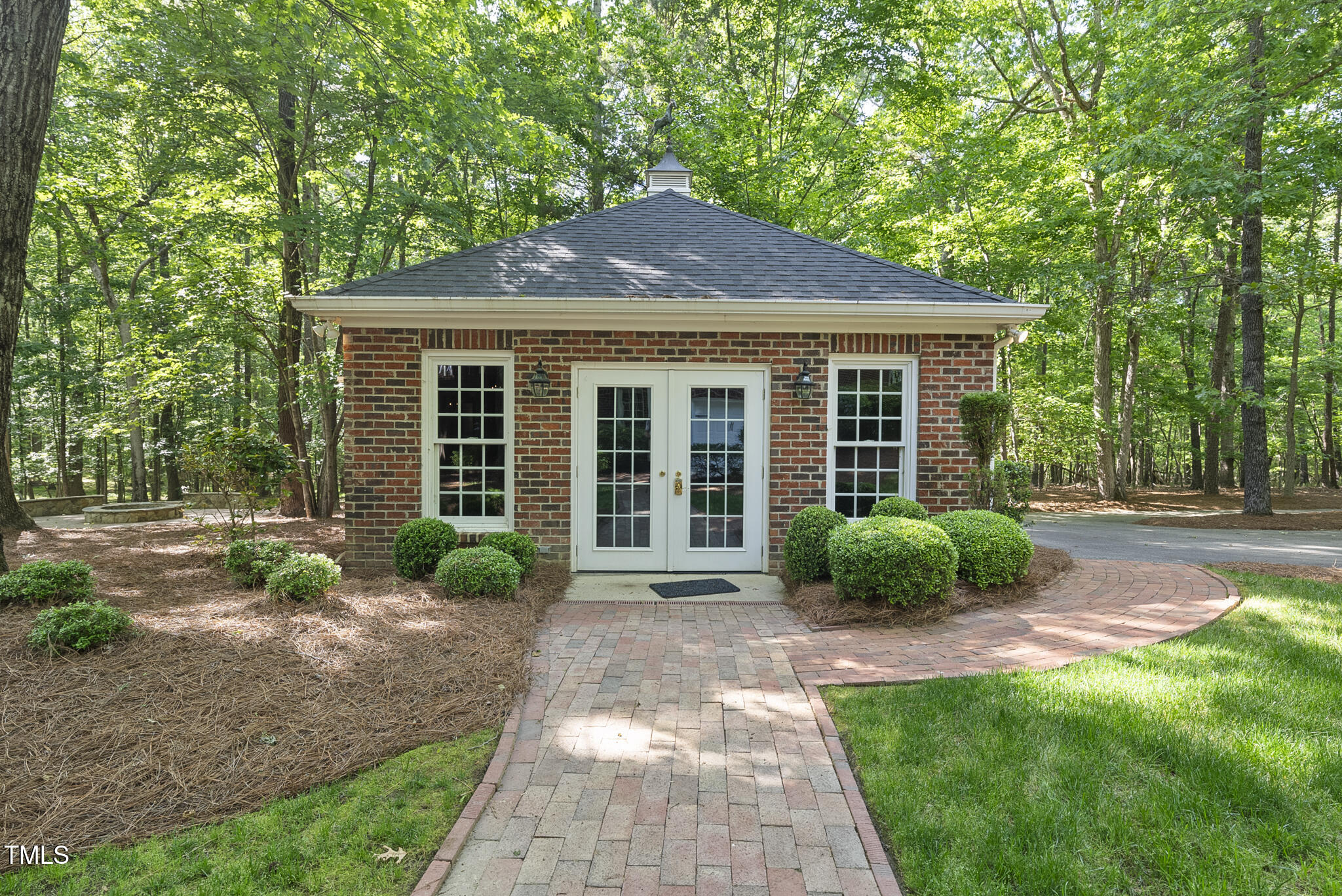 10825 Rondeau Woods Court Raleigh, NC 27614 - Photo 55 of 65 a front view of a house with garden
