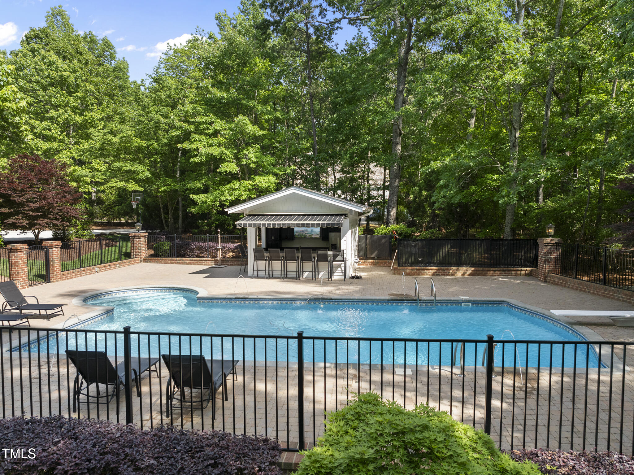 10825 Rondeau Woods Court Raleigh, NC 27614 - Photo 60 of 65 a view of a balcony with two chairs and a table
