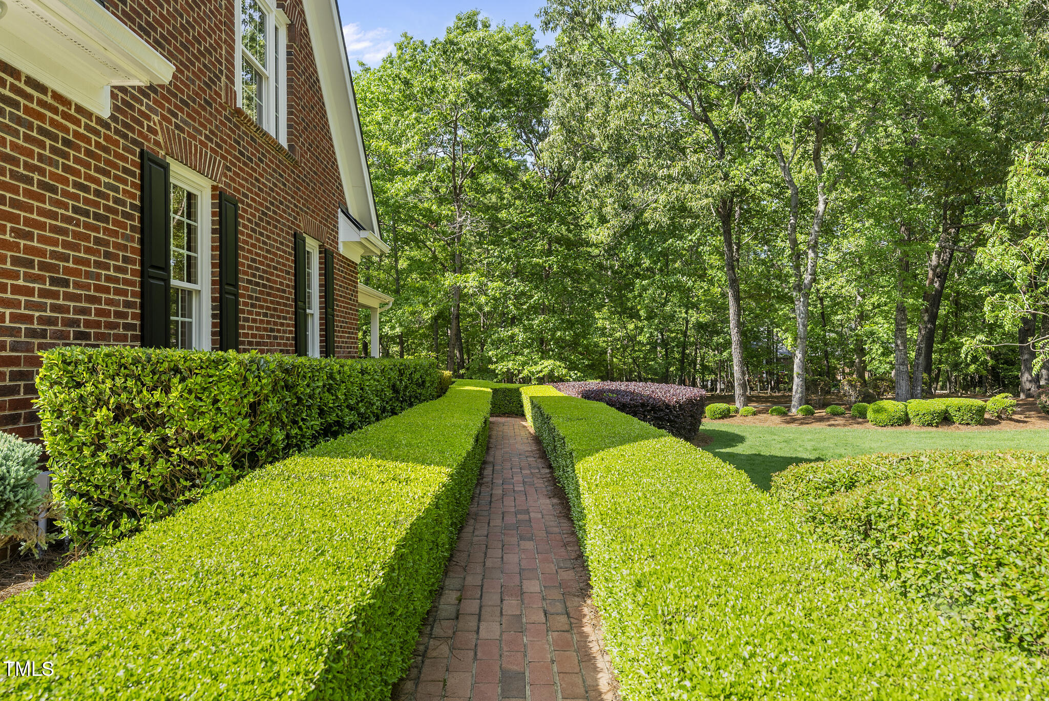10825 Rondeau Woods Court Raleigh, NC 27614 - Photo 4 of 65 a view of a house with a backyard