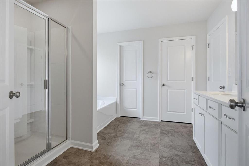 585 Summit Point Canton, GA 30114 - Photo 14 of 30 a view of a bathroom with mirror